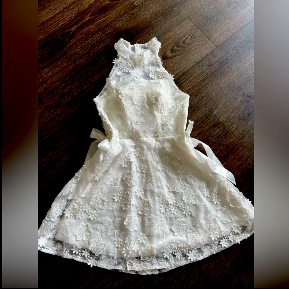 New White halter style short dress with lace overlay